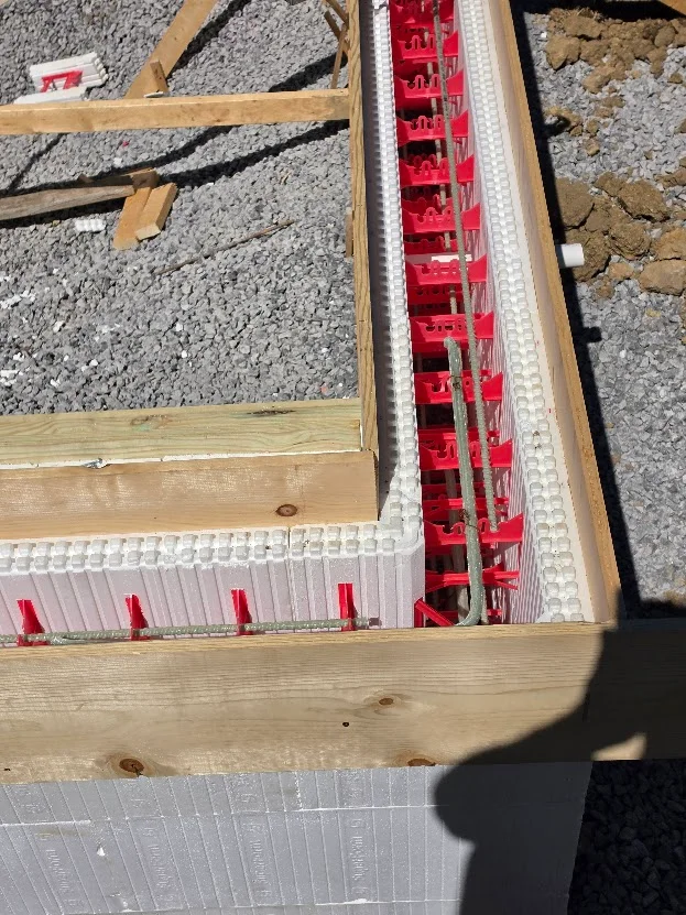 Insulated concrete form pool walls with rebar before the concrete pour